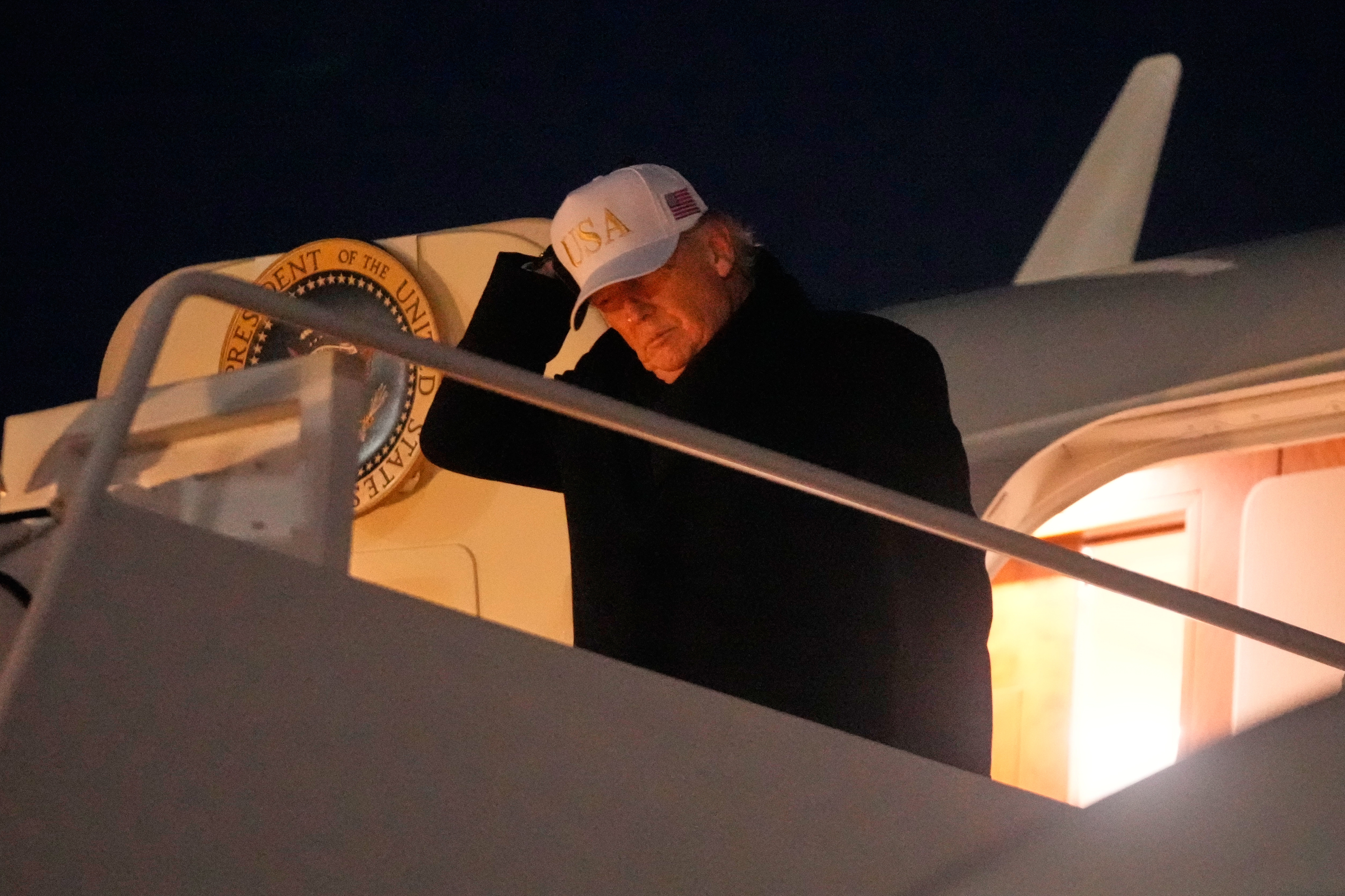 President Trump arrives at Joint Base Andrews in Maryland on Sunday after returning from a trip to Florida. He says he will move to close the Kennedy Center for two years for renovations.